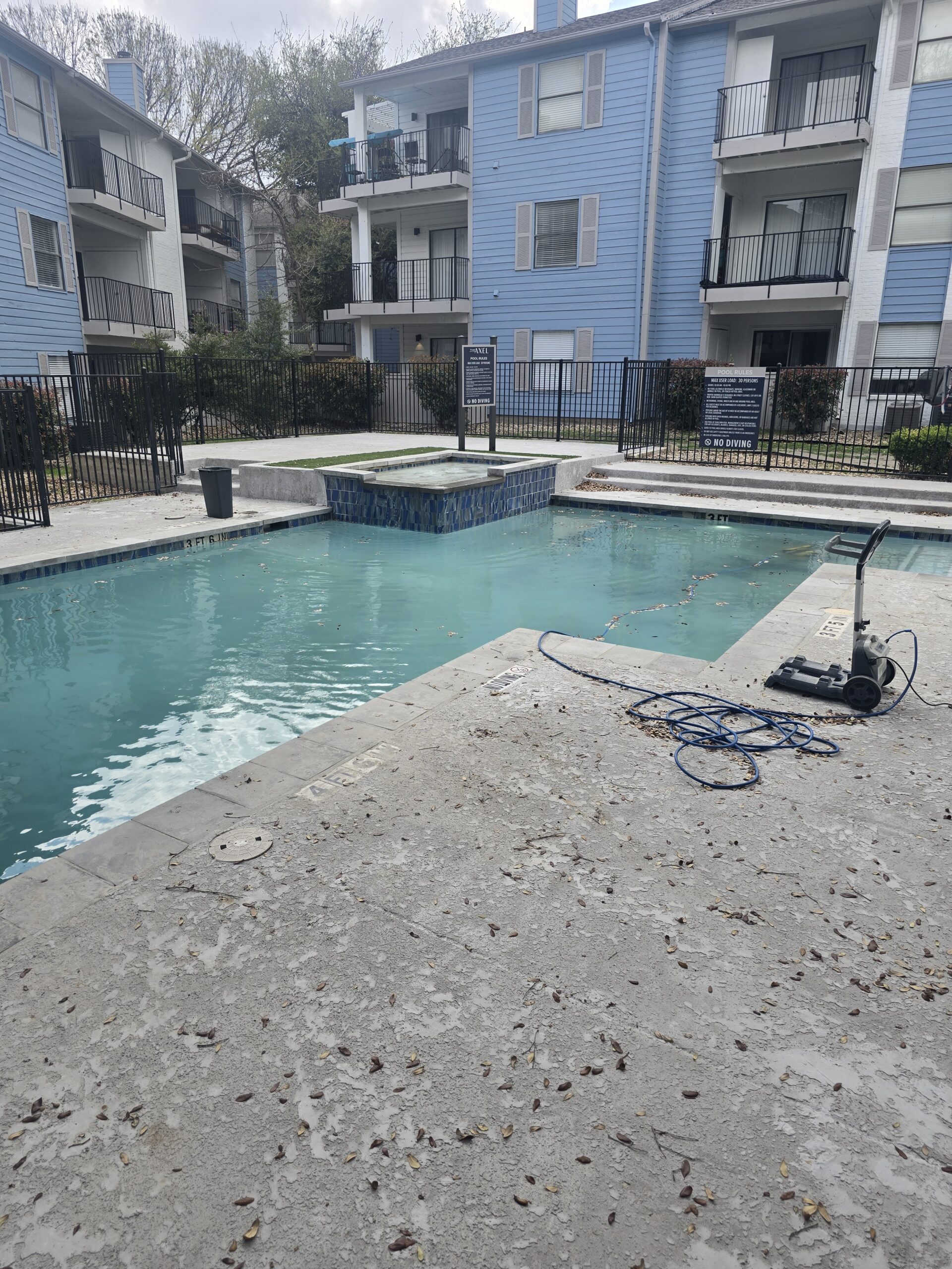 Before: pool with damaged and peeling plaster surface