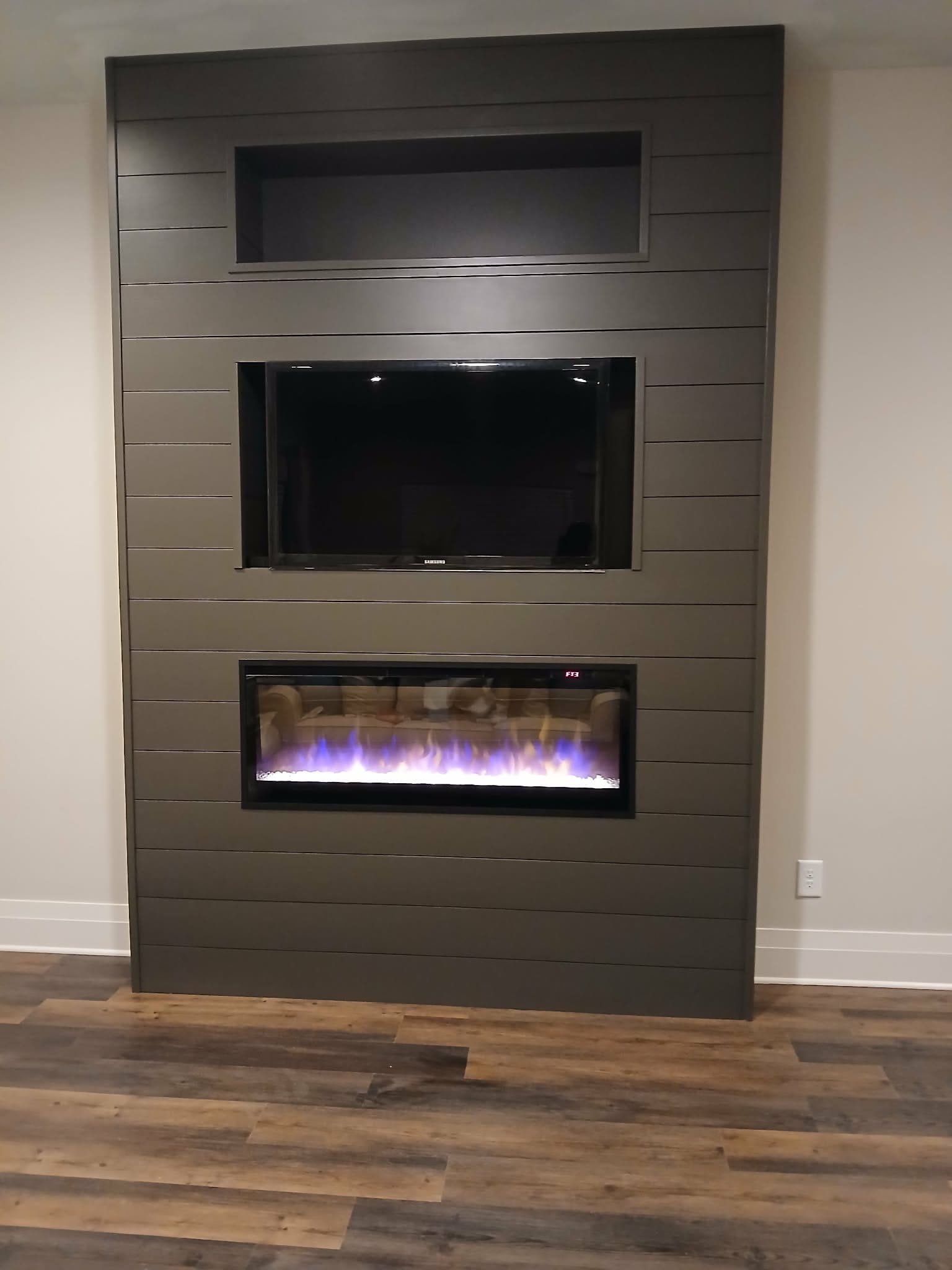 Custom built-in entertainment wall with fireplace - Torres Pro Services Austin