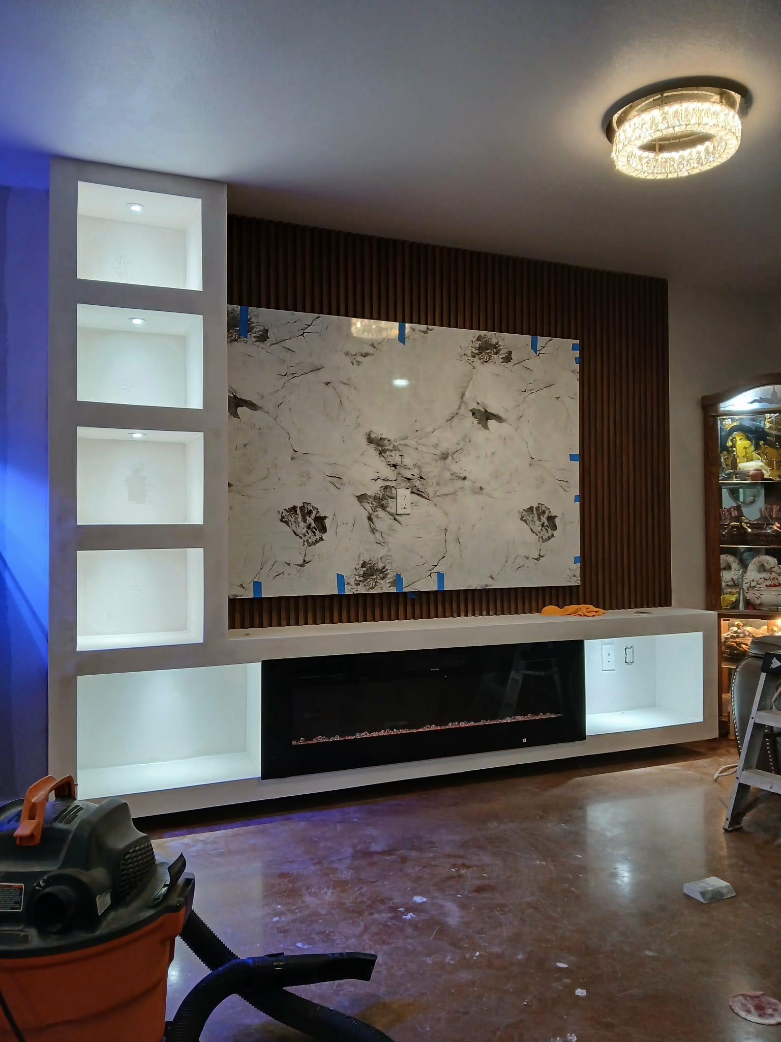 Home remodeling - custom entertainment wall completed - Torres Pro Services Austin