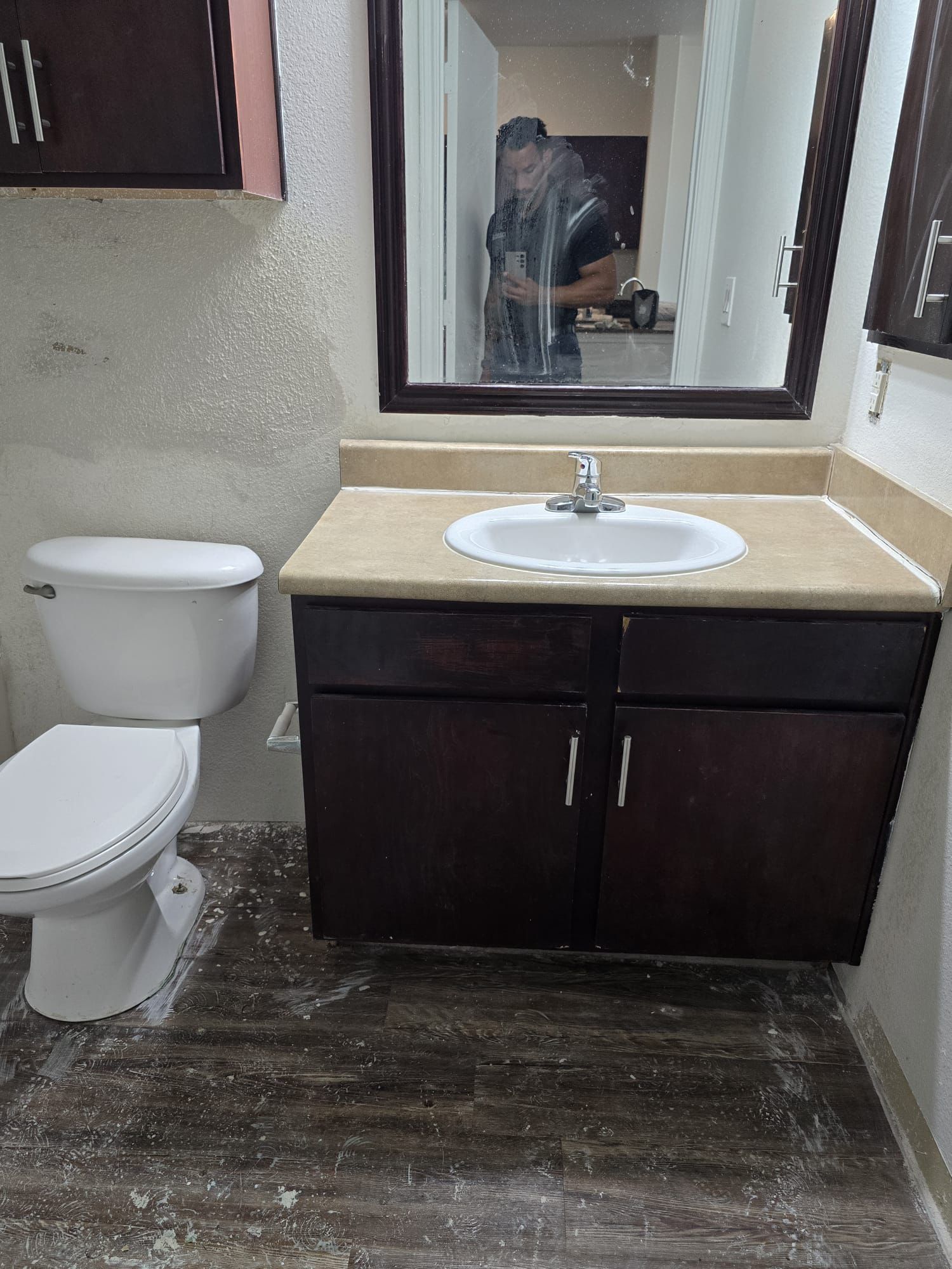 After: finished bathroom remodel with new vanity and flooring